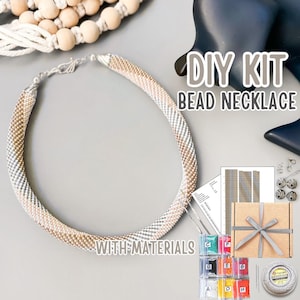 May include: DIY bead necklace kit with all materials included. The kit includes beads, thread, instructions, and a finished example of the necklace. The necklace is made with silver and gold beads.