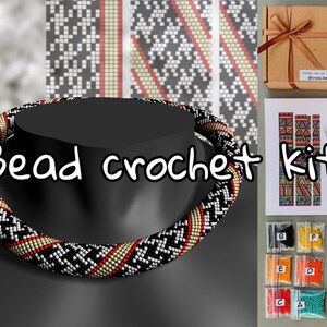 May include: A bead crochet kit featuring black, white, red, and beige beads. The kit contains instructions, needles, and beads in a variety of colours.