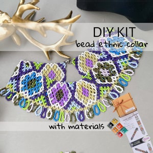 May include: DIY kit to make a beaded ethnic collar necklace. The kit includes all the materials needed, including beads, thread, and instructions. The finished necklace features a colourful floral pattern with shades of purple, blue, green, and white.