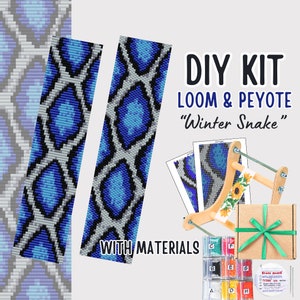 May include: A DIY kit for loom and peyote beading, featuring a "Winter Snake" design. The kit includes materials, a wooden loom, and a pattern. The design showcases a blue, gray, and black snake pattern. The kit is packaged in a brown box with a green ribbon.