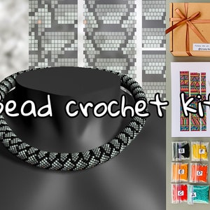 May include: A bead crochet kit with a black and white beaded necklace, colorful beads in small bags, and a pattern chart. The kit includes needles, a spool of thread, and a small gift box with a ribbon.