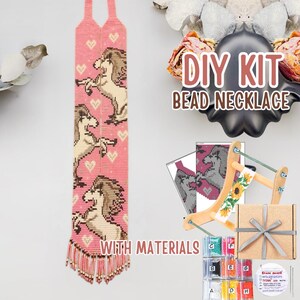 May include: A pink beaded necklace with a horse design and heart accents. The necklace is part of a DIY kit that includes materials. The kit also includes a wooden loom, beads, and a gift box.
