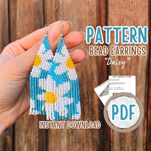 May include: A PDF pattern for beaded earrings with a daisy design. The earrings are blue, white, and yellow. The pattern includes instructions for making the earrings.