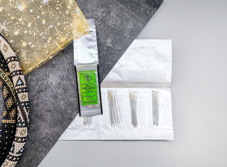 Create stunning jewelry with Nickel Plated Beading Needles, Regal Size 12. Perfect for detailed beadwork and sewing beads onto fabric. Durable and easy to use, these needles are a must-have for crafters.