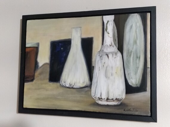 Still life painting of bottles on a table in acrylic on canvass with hand made wood frame