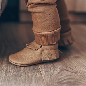 Soft sole barefoot baby moccasins with custom name, flexible leather shoes for newborn, ideal for early walking stages