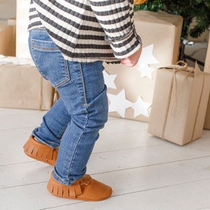 Custom baby moccasins packaged in a gift box, soft leather infant shoes with name, unique newborn present idea