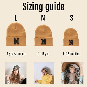 May include: Sizing guide for a brown knitted beanie with a black felt letter N. The beanie is available in three sizes: small, medium, and large. The small beanie is for babies 0-12 months, the medium beanie is for toddlers 1-5 years old, and the large beanie is for children 6 years and up.