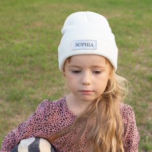 Our kids beanie hats with names are the perfect way to keep your child warm and stylish this winter. Choose from a variety of colors and designs, and add your child's name for a personalized touch.
