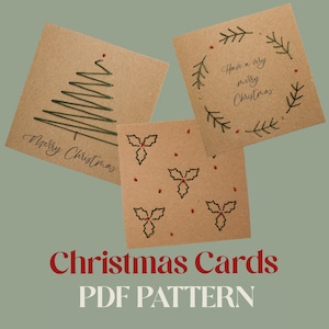 May include: Three square Christmas cards with brown paper backgrounds. One card features a stitched Christmas tree design, another has a wreath with text, and the third has holly designs. The words "Merry Christmas" are on one card. The words "Christmas Cards PDF PATTERN" are at the bottom.