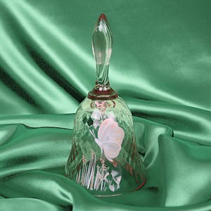 lovely Fenton Diamond Optic art glass bell in a delicate, semi-transparent pink with a hand painted butterfly symbolizing grace and beauty