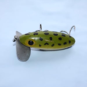 collectible vintage Fred Arbogast wooden Jitterbug saltwater fishing lure painted as a frog