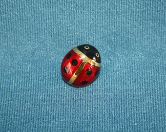 sweet little enameled ladybug tac pin by Carolee Friedlander, ladybugs are said to represent transformation, good luck, love & happiness
