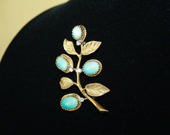 authentieke Cellino 18K geelgouden broche met 4 diamanten en 4 turquoise cabochons uit de Cellino "Perzische" lijn