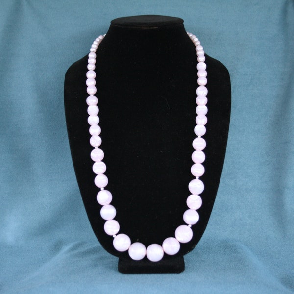 fashionable pearlized lucite beaded necklace by Monet in a soft lilac symbolizing first love and romance