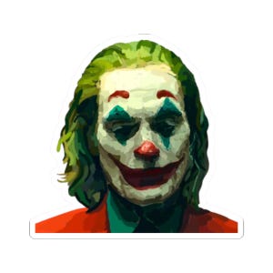 May include: A sticker featuring a painted image of the Joker. The Joker has white face paint, red lips and nose, green hair, and teal and red accents. He is wearing a red jacket and a green shirt.