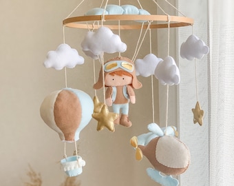 Baby mobile boy, crib mobile boy, Pilot with airplane and helicopter hot air balloon in the sky with clouds and stars.