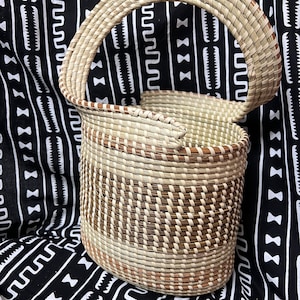 Gullah One of a Kind Twist Handle  Oval Sweetgrass Basket made in charleston South Carolina in Gullah/Geechee sewing style