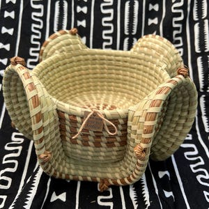 Gullah stand elephant ear Charleston Sweetgrass Basket with love knots made in charleston South Carolina in Gullah/Geechee sewing style