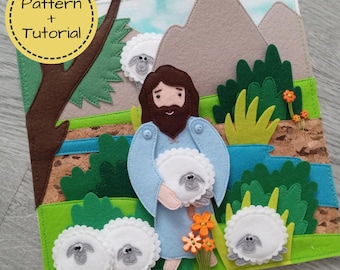 May include: A felt quiet book page featuring a biblical scene. A figure in blue holds a sheep, surrounded by other sheep, green bushes, and mountains. The text "Pattern + Tutorial" is in a yellow circle.