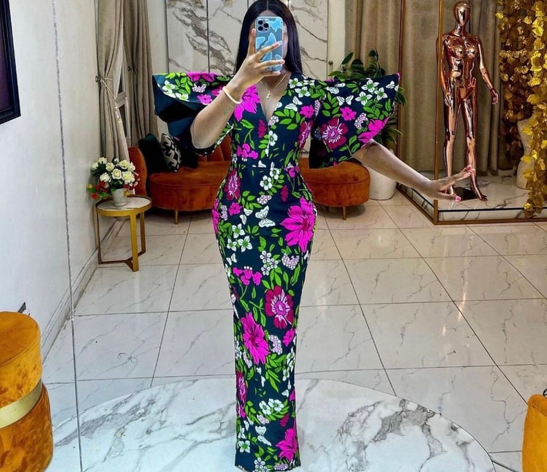 Infinity freesize maxi dress in a bold multicoloured floral Print.