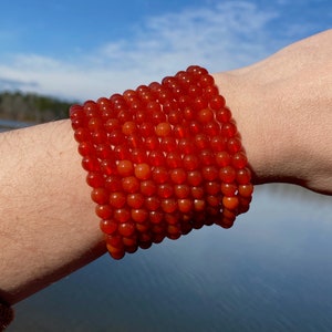 ONE All Natural 6mm 7.5&quot; Carnelian Crystal Stretch Bracelet