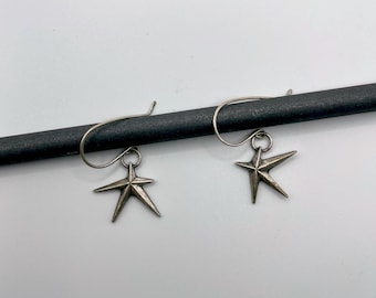 Star earrings, asymmetrical star earrings, silver star earrings, minimalist earrings, modern earrings, celestial jewelry, celestial earrings