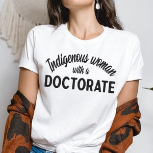 Indigenous Woman with a doctorate shirt, Indigenous Owned shop, Doctoral Grad Doctorate Degree Student PHD Graduation Doctor of Education