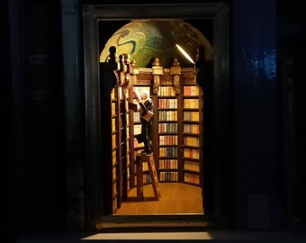Book nook shelf insert, the bookworm after the painting by Carl Spitzweg. Collector, bookend