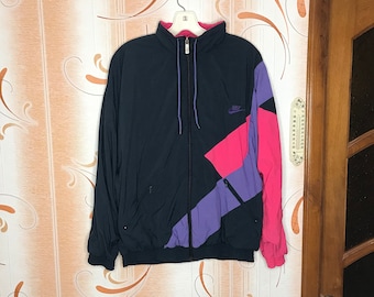 Chaqueta cortavientos Nike vintage colorida de los años 00 con el logo grande y el logo Swoosh, talla L