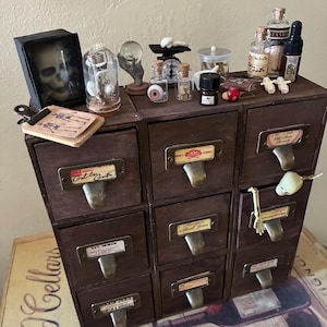 Handcrafted Halloween Apothecary Cabinet – 9-Drawer Miniature with Spooky Accessories