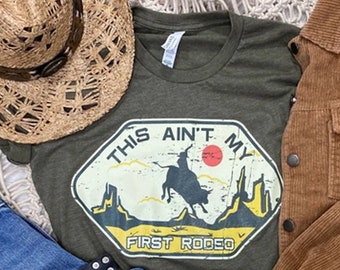 This ain't my first rodeo t-shirt - Cowboy shirt - Unisex shirt - Cowgirl shirt - Rodeo shirt - Gift for her - Cute t-shirt - Horses