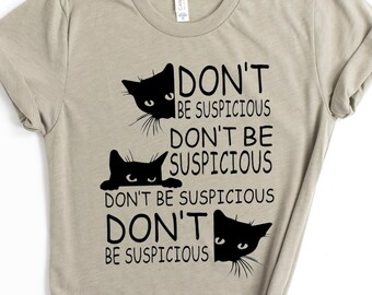 Black cat t-shirt - Don't be suspicious - Women's tee - halloween - heather stone soft tee