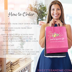 May include: A pink paper bag with a white handle and a design of lemons and a hanger with the text "Sweet Tee Apparel & Gifts" and "A Sip of Style Worthwhile". The bag is being held by a person in a blue dress.