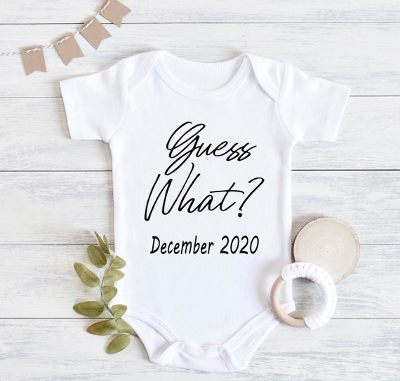 Guess what baby onesie 2025