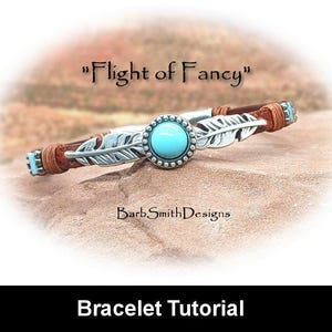 May include: A turquoise gemstone bracelet with a silver feather charm and brown leather cord. The bracelet is labelled "Flight of Fancy" and "BarbSmithDesigns".