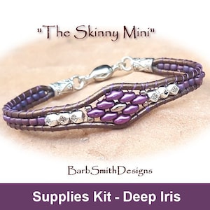 May include: A purple and brown beaded bracelet with a silver clasp. The bracelet is called "The Skinny Mini" and is a supplies kit for making a bracelet in the color "Deep Iris".