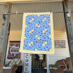 May include: A set of three ceramic mugs with a speckled, matte finish. The mugs are in shades of cream, light gray, and dark gray. Each mug has a simple, minimalist design, perfect for coffee or tea.