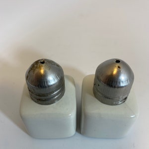 Vintage miniature ceramic salt and pepper shakers with Crome tops