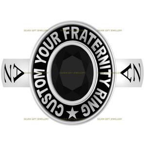 May include: A silver ring with a black stone and the words "Custom Your Fraternity Ring" around the stone.