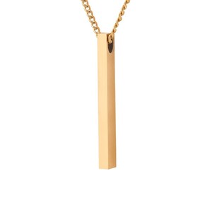 May include: A gold chain necklace with a long, rectangular pendant.