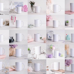May include: A collection of 25 white ceramic mugs arranged in a grid pattern on a white background. The mugs are all the same size and shape, and they are all empty.