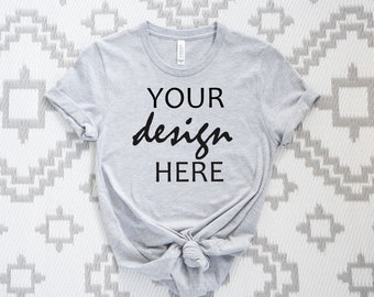 May include: A gray t-shirt with the text "YOUR design HERE" printed on the front.