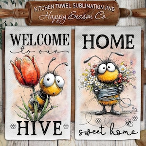 May include: Two white kitchen towels with bee-themed designs. One towel says "WELCOME to our HIVE" with a bee and a tulip. The other says "HOME sweet home" with a bee holding flowers. A rolling pin is at the top.