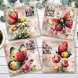 May include: Set of four square coasters with butterfly and floral designs. Each coaster features a different butterfly illustration with phrases like "Let Your Spirit Soar" and "Stay Beautiful". The coasters are made for sublimation.