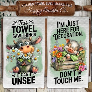 May include: Two white kitchen towels with whimsical designs. One features a cartoon cow holding daisies with the text "This towel saw things, it can't unsee." The other shows a pig in a wooden crate with flowers and the text "I'm just here for decoration, don't touch me."