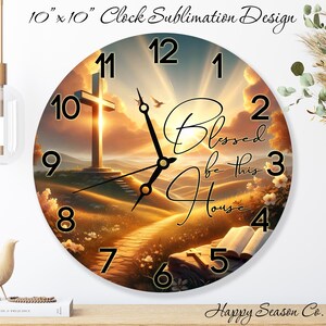 May include: A round wall clock with a scenic landscape design. The clock face features a cross, a path, and the words "Blessed be this House." The clock is 10 inches in diameter.