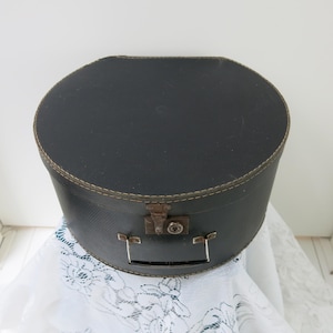 Old dark brown hat box