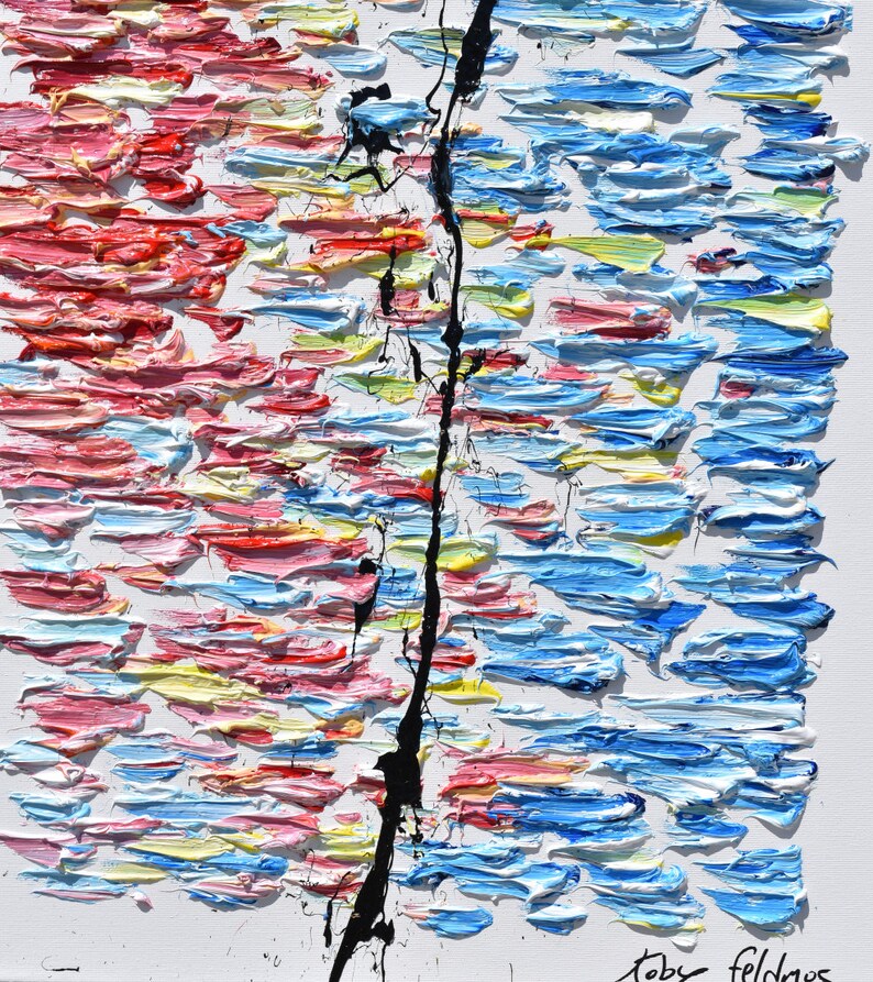 May include: Abstract painting with a black line dividing the canvas in half. The left side is painted in shades of pink, red, yellow, and blue. The right side is painted in shades of blue, white, and yellow. The artist's signature, "Toby Feldmos", is in the bottom right corner.