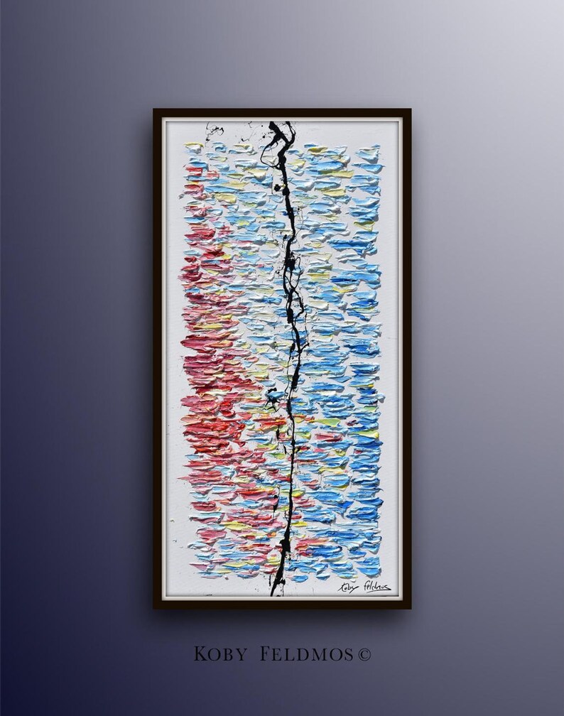 May include: Abstract painting with a black line down the center, surrounded by colorful, textured brushstrokes in shades of red, blue, yellow, and white. The painting is framed in black.